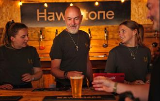 Serving the beer Hawkstone brewery