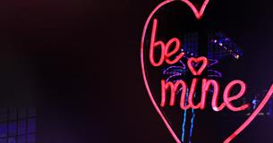 Neon "Be Mine" heart shaped sign