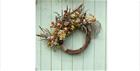 All natural wreath on a wooden door