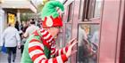 Elf looking in steam train window
