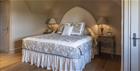 Elegant bedroom at Poulton Hill