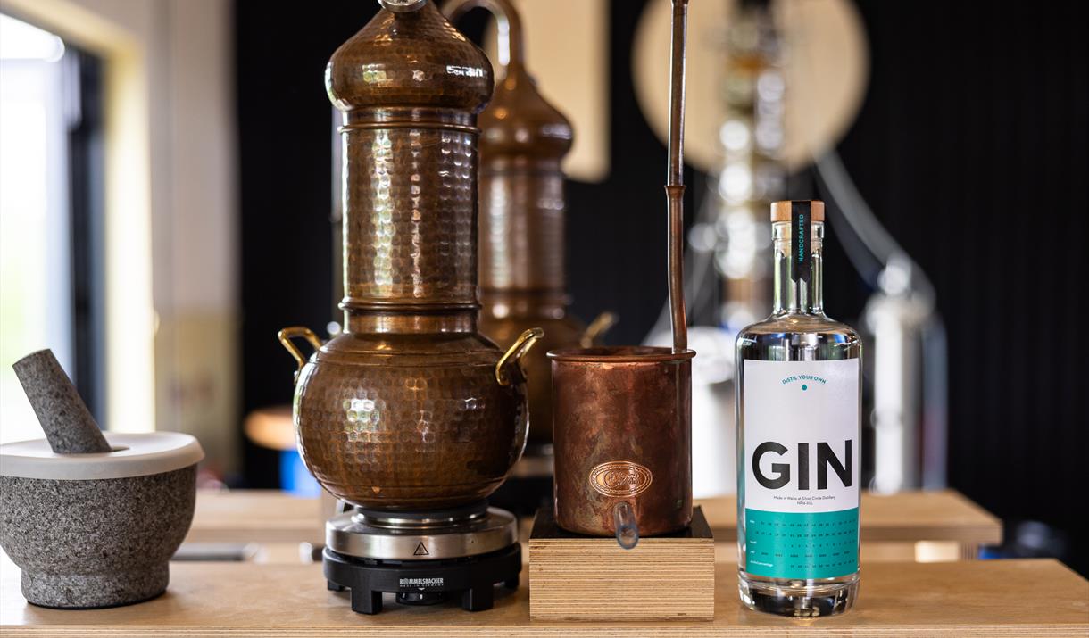 gin bottle and the distillers @ Silver Circle Distillery