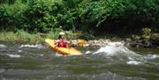 Kayaking the Symonds Yat rapids on The River Wye with www.inspire2Adventure.com
