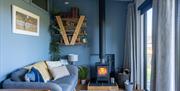 The Nest Luxury Glamping lounge with fire
