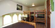 bedroom with bunkbeds and one double bed