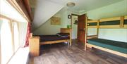 bedroom with bunkbeds and one double bed