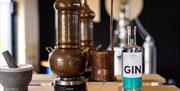 gin bottle and the distillers @ Silver Circle Distillery