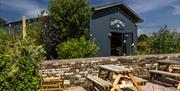 benches in the garden @  Silver Circle Distillery