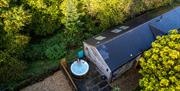 lady in a hut tub at Rowan Tree Retreat