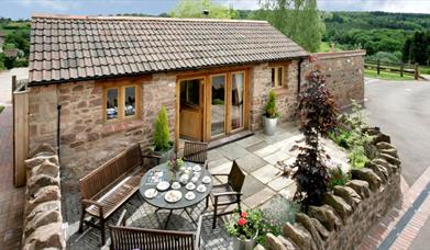 Meadow Byre - Forest Barn Holidays patio outside