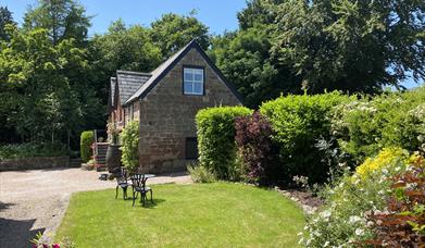 Granton Coach House in Goodrich near Ross on Wye.  Beautiful any time for 2 people. The sun-filled garden for guests use.