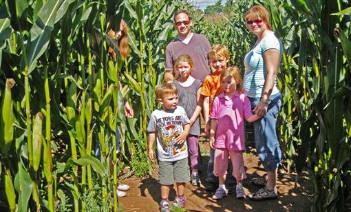 A family in the Giant Maze.and Activities Maze