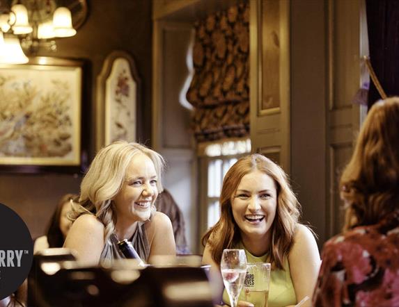 Girls enjoying a drink in Blackbird