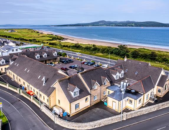 Aerial image of Harbour Inn with Lough Swilly in the background