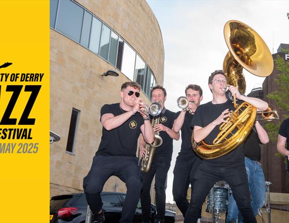 Band playing al fresco on the steps beside Millennium Forum and Richmond Centre