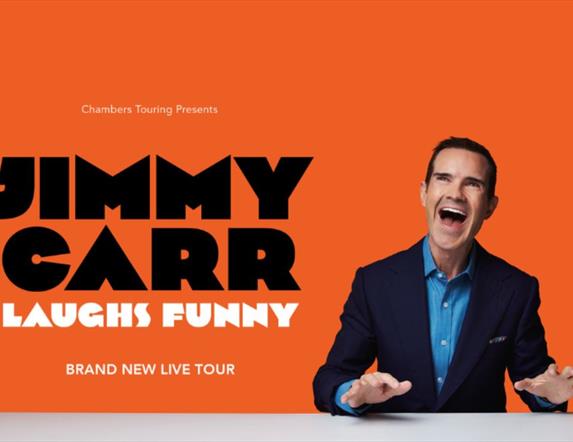 Promotional image of Jimmy Carr laughing.