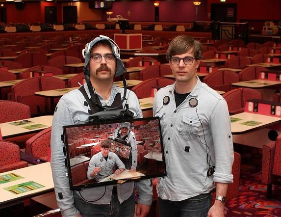 Two men standing in a bingo room