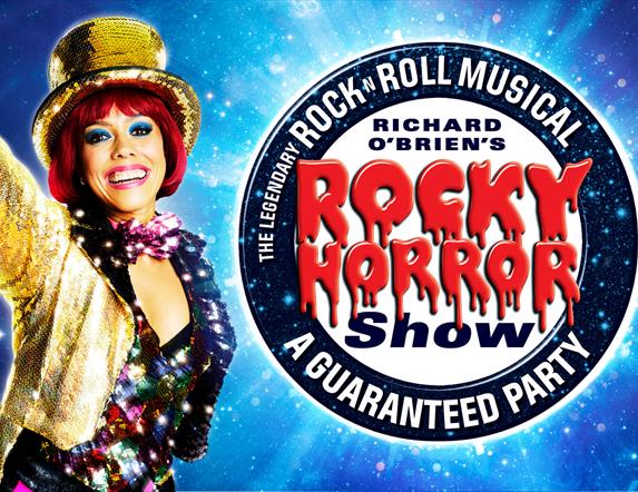 Promotional image for Richard O'Brien's Rocky Horror Show, featuring a vibrant performer wearing a gold sequinned top hat and jacket, smiling brightly
