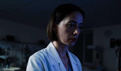 Woman looking downwards