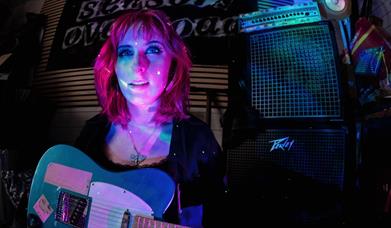 Woman with guitar