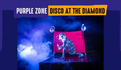 Dancer surrounded by smoke promoting the Disco at the Diamond as part of the Derry Halloween Awakening Trail 2025