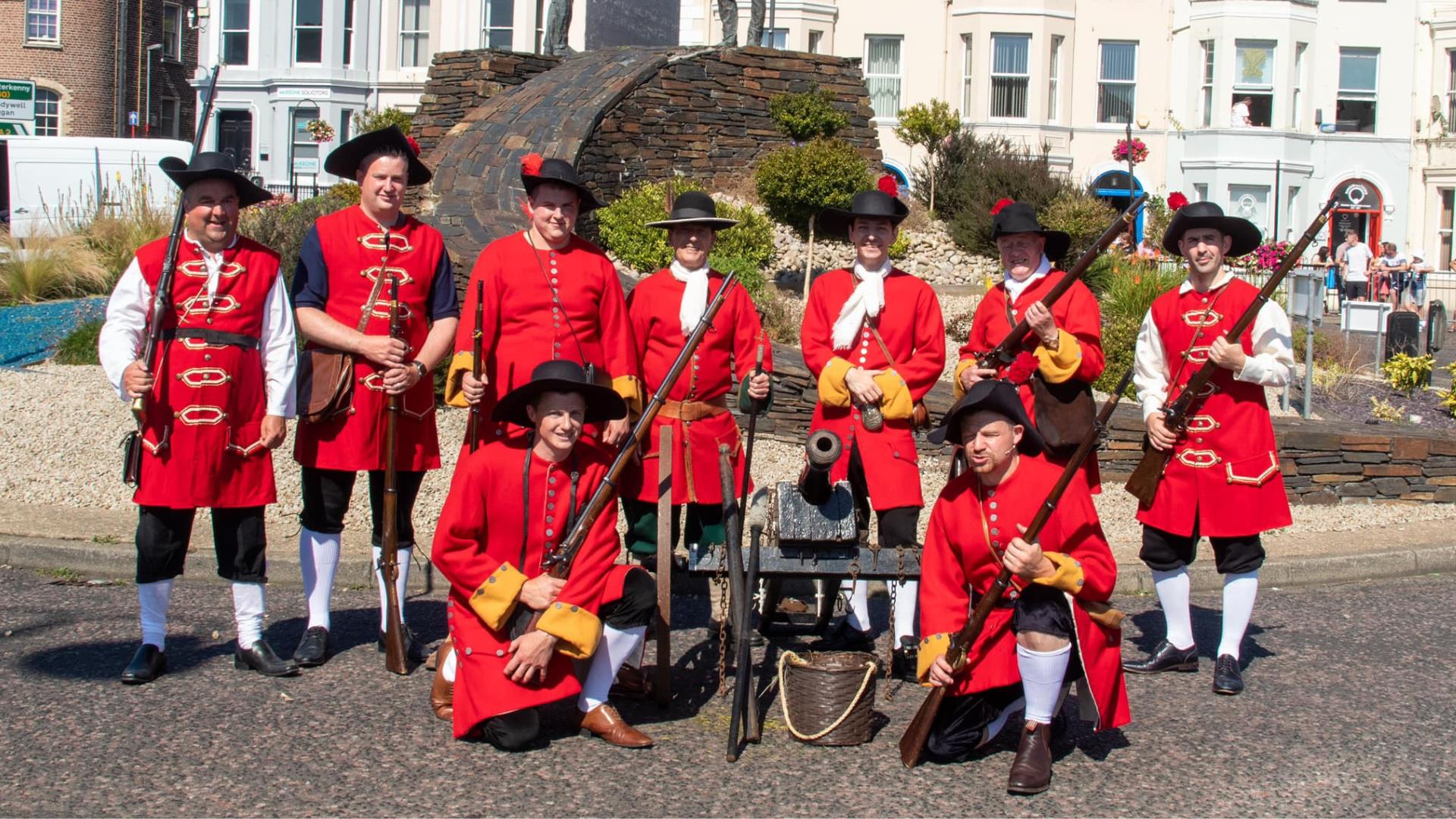 Group photo of people in costume.