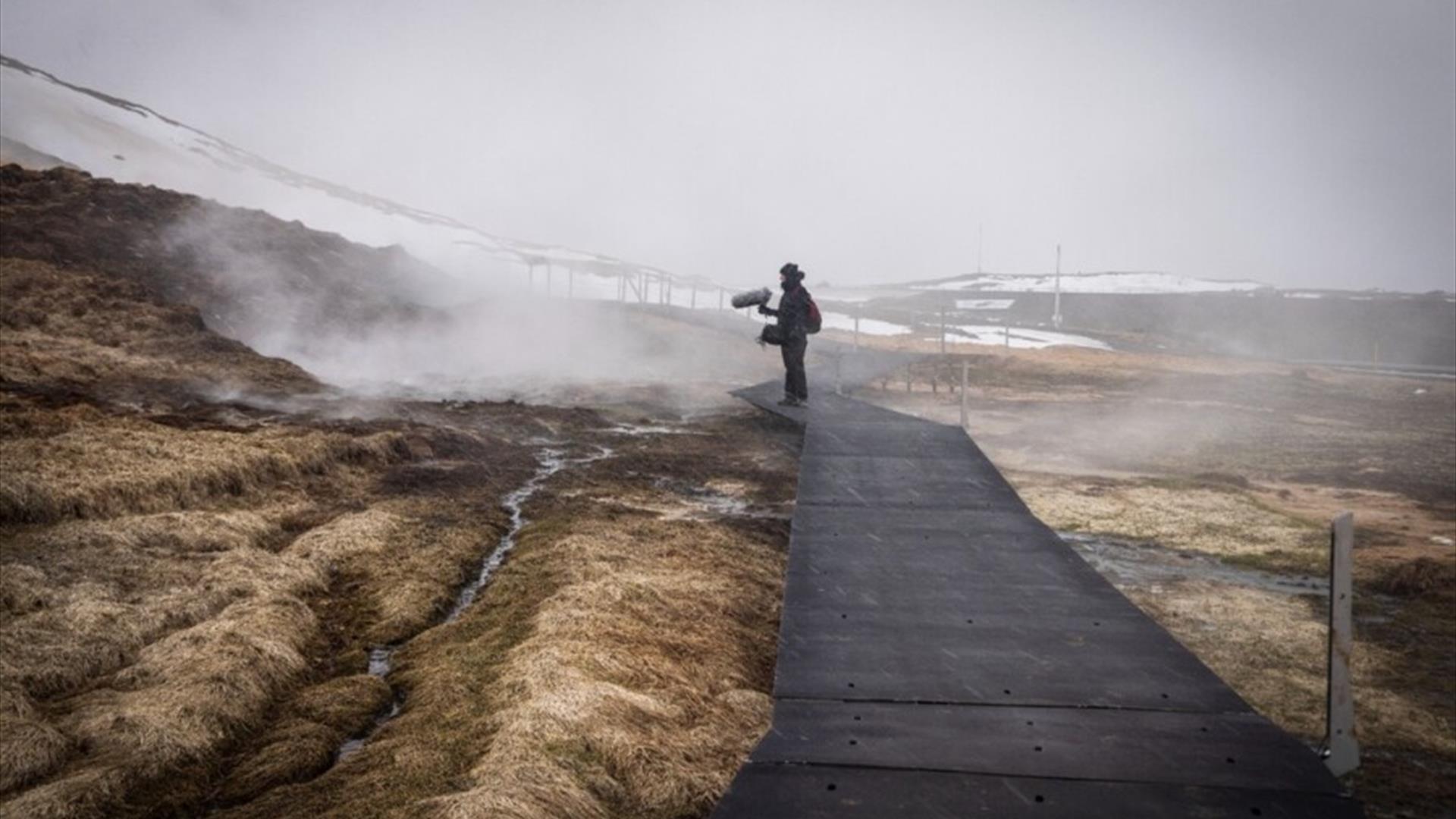 Person stands in the wilderness