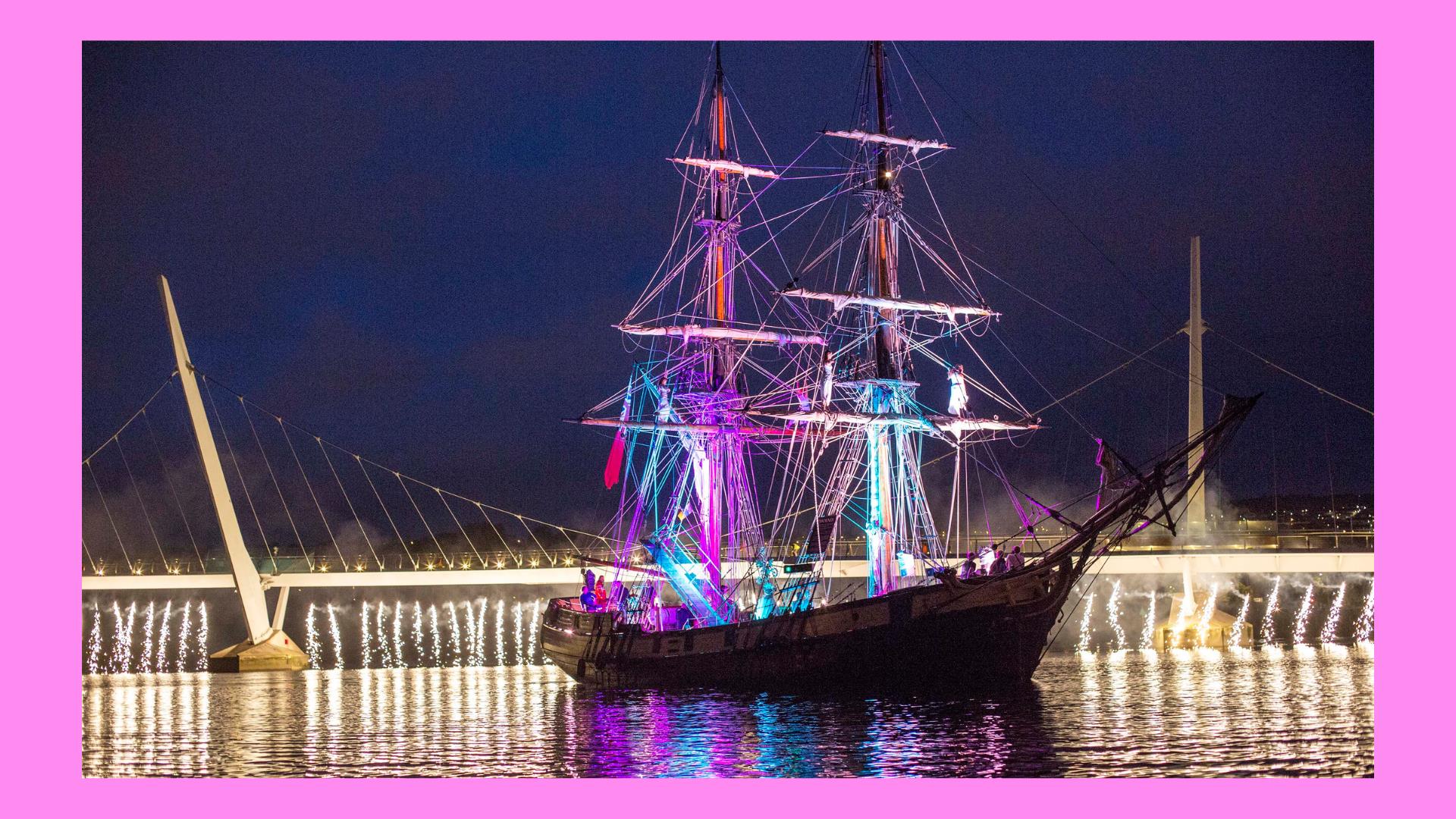 image of tall ship and fireworks