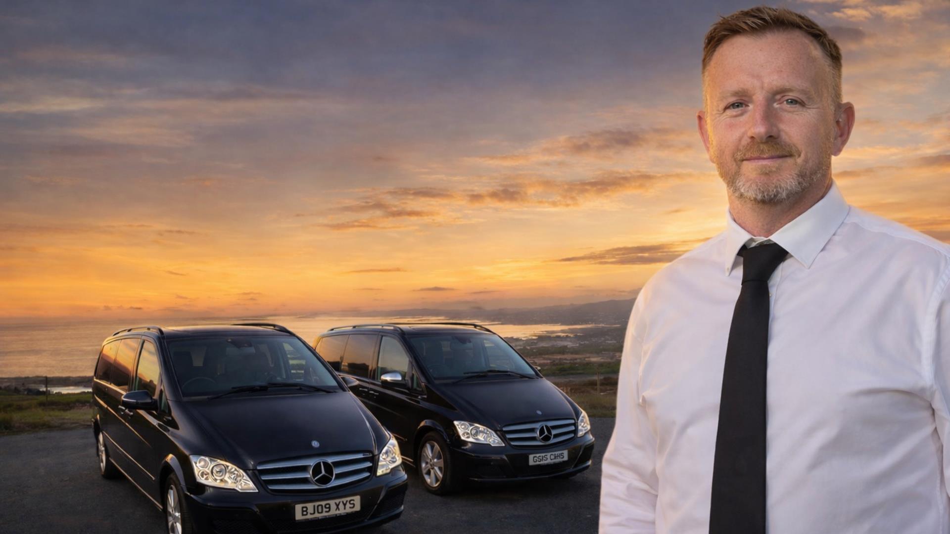 Photo of the owner of GS Chauffeurs in front of his vehicles
