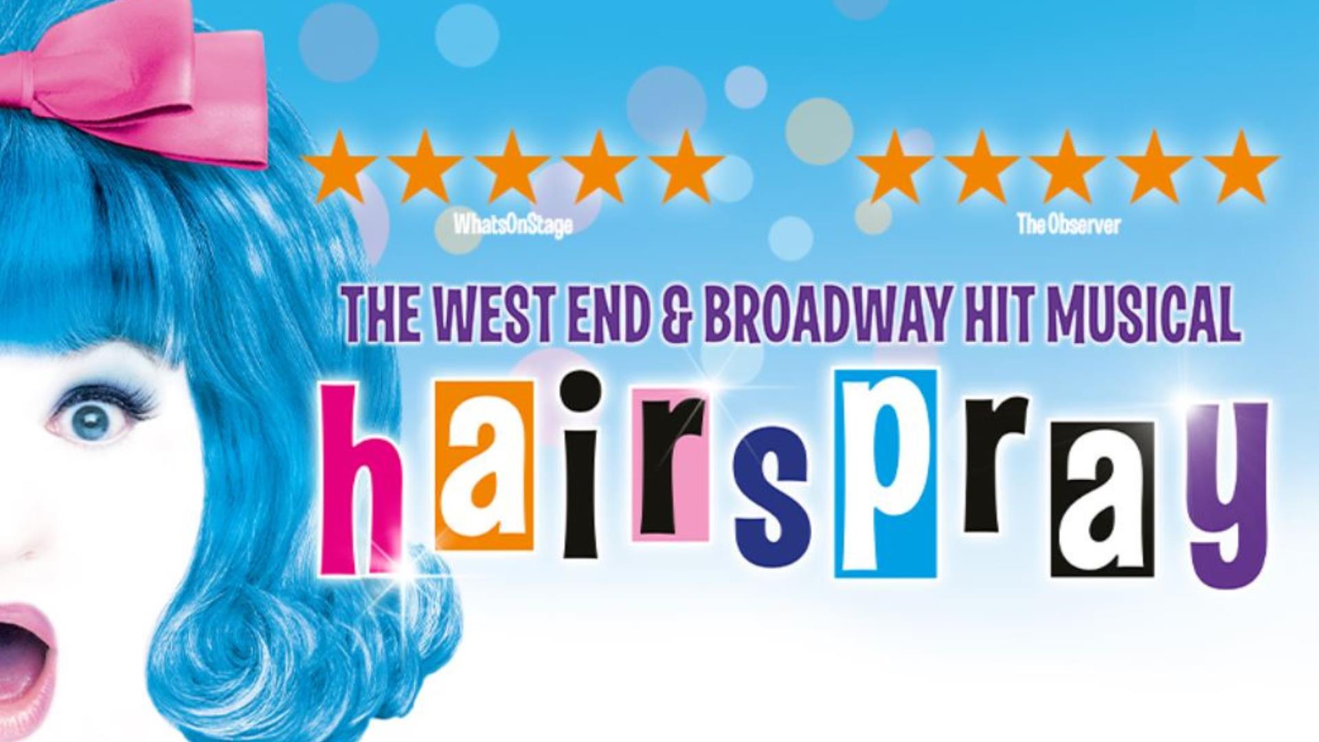 The Hairspray logo with two five star reviews and a woman with blue hair and a pink ribbon.