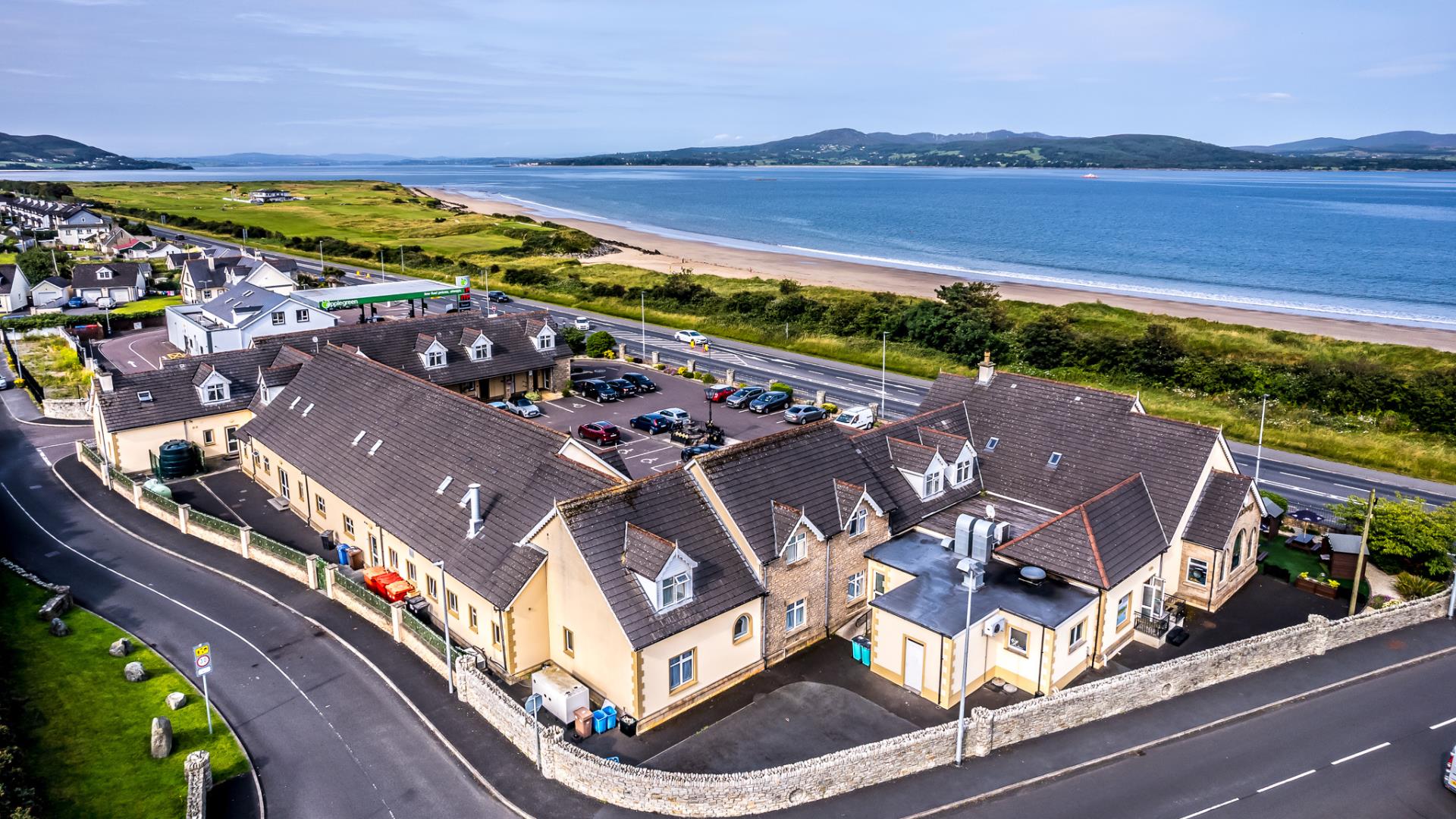 Aerial image of Harbour Inn with Lough Swilly in the background