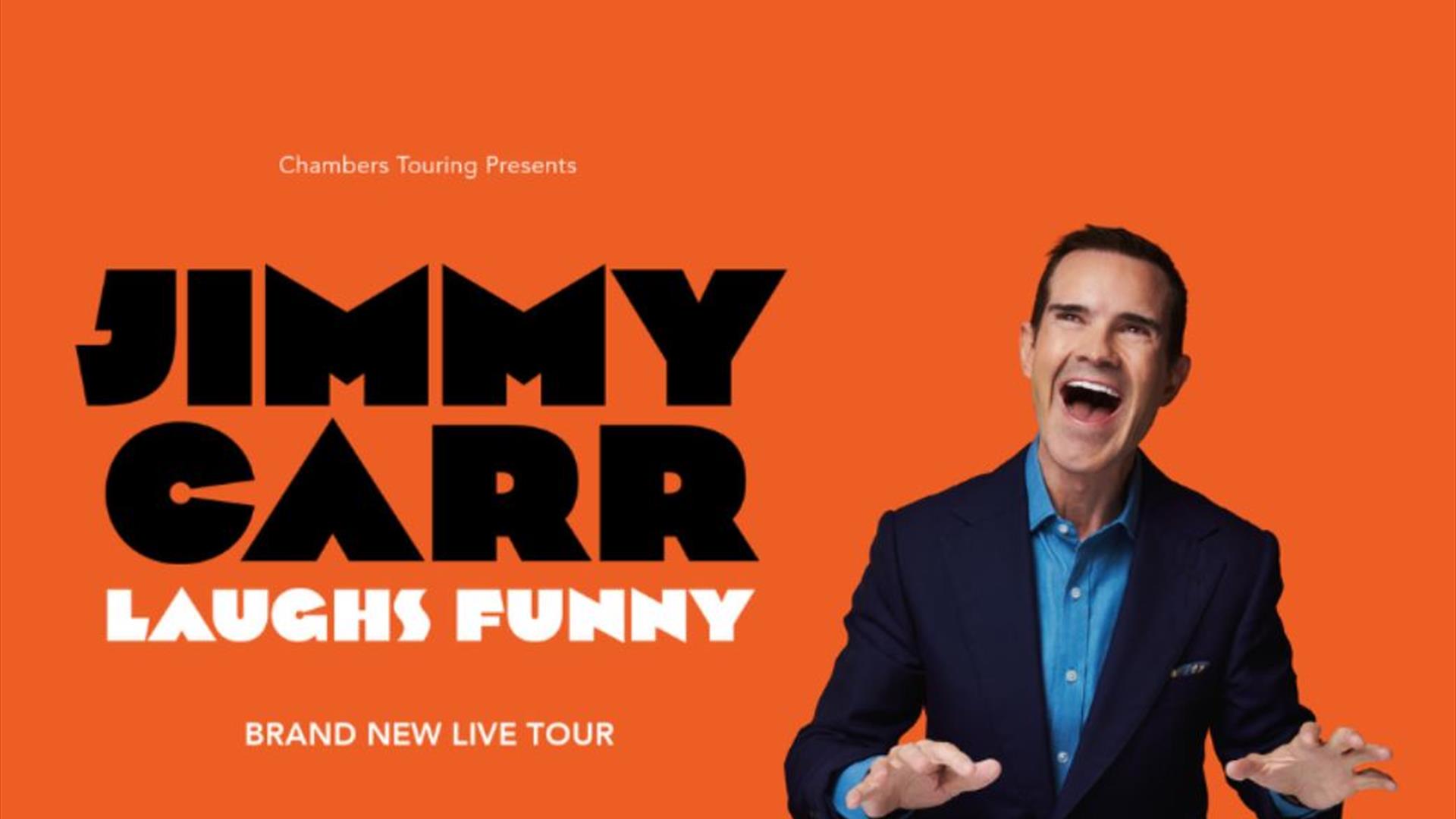 Promotional image of Jimmy Carr laughing.