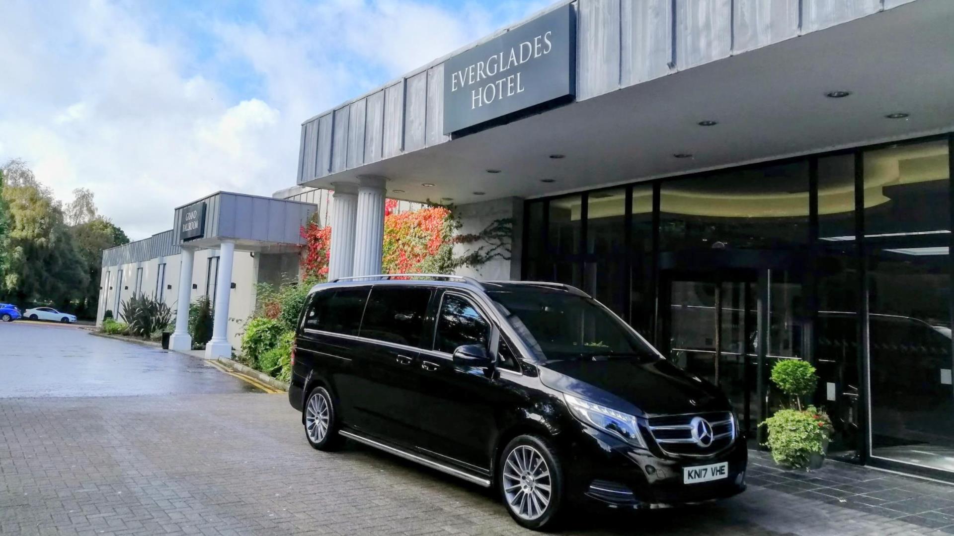 Legenderry Chauffeurs outside the Everglades Hotel