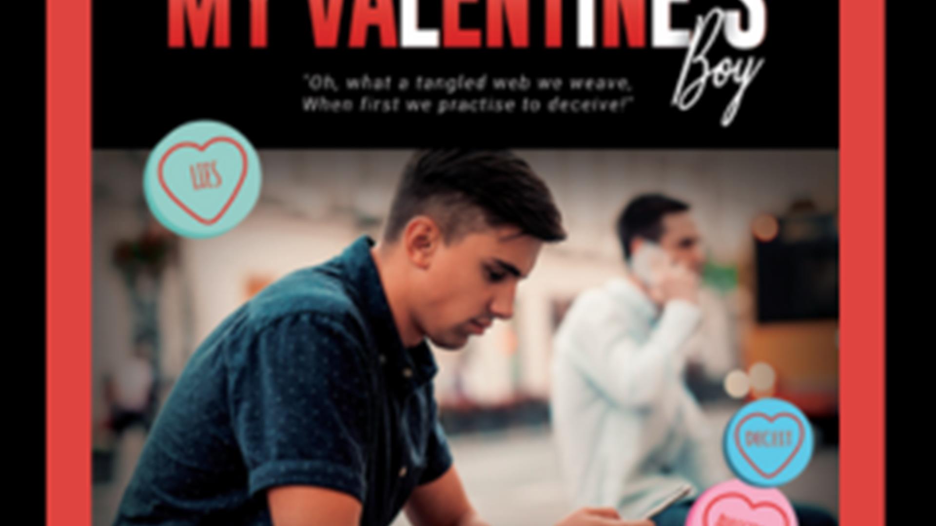 Image of young man sitting contemplating with the text My Valentine's Boy above
