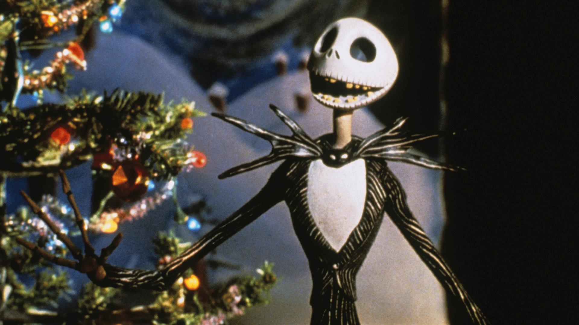 Jack Skellington in front of a Christmas tree