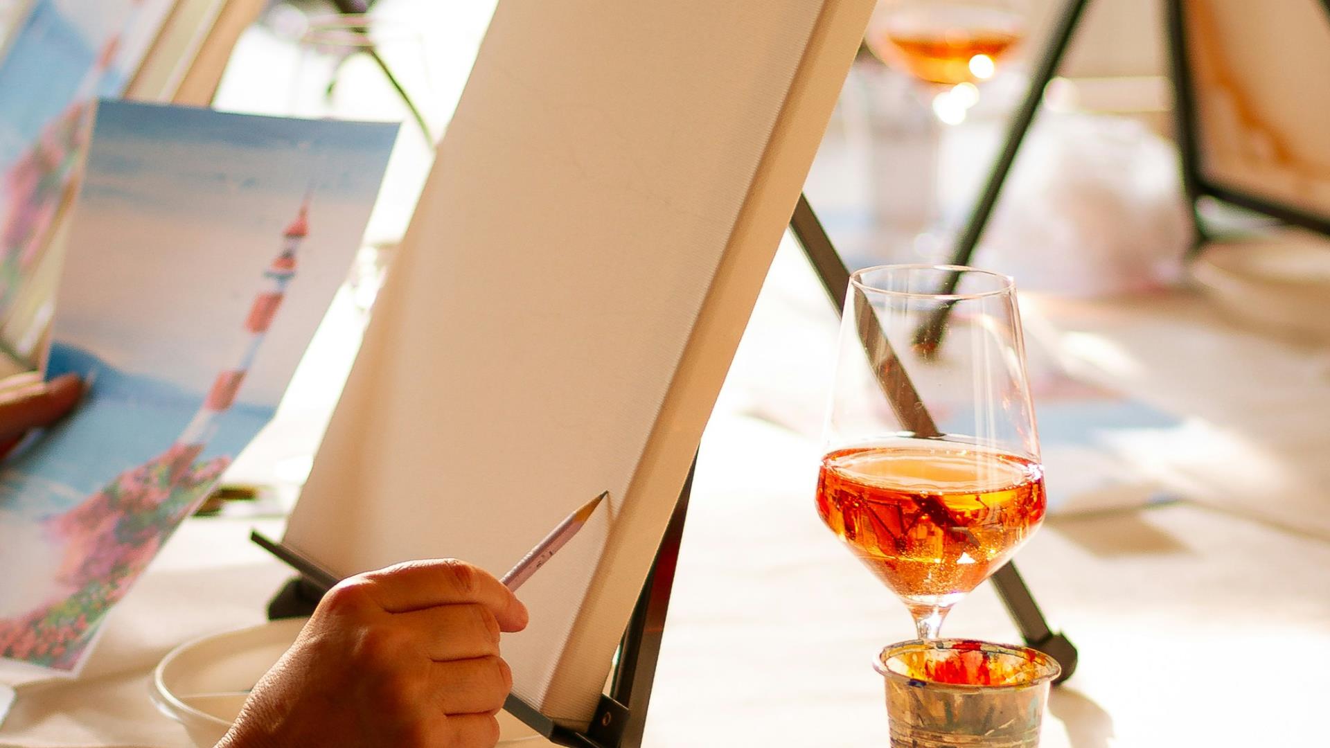 Someone drawing on a canvas