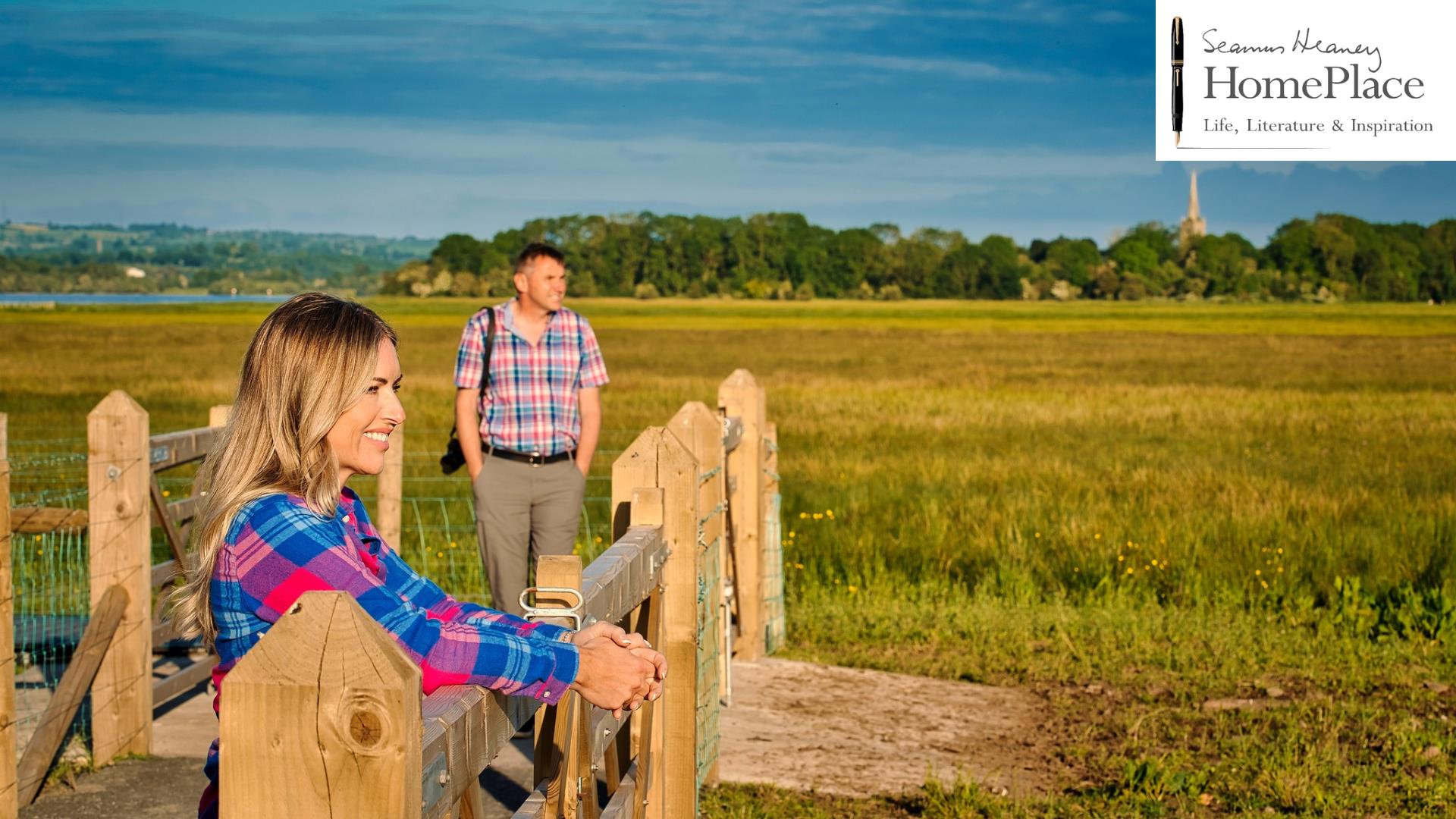 Couple exploring the Open Ground at Seamus Heaney Homeplace