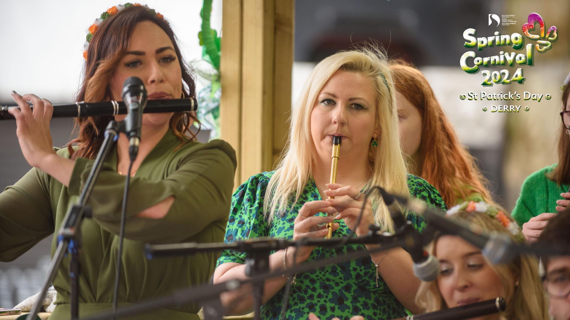 Promotional image for the 'Live Music at the Guildhall Square' Spring Carnival event, showing several people playing instruments.