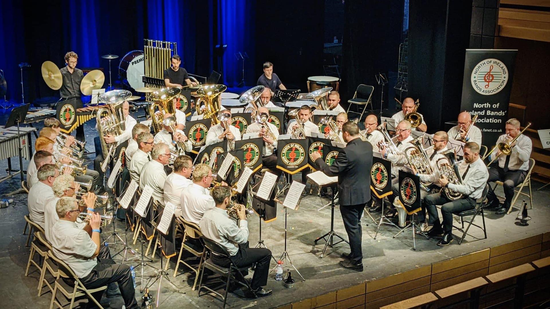 The Strabane Brass Band gathered at a performance.