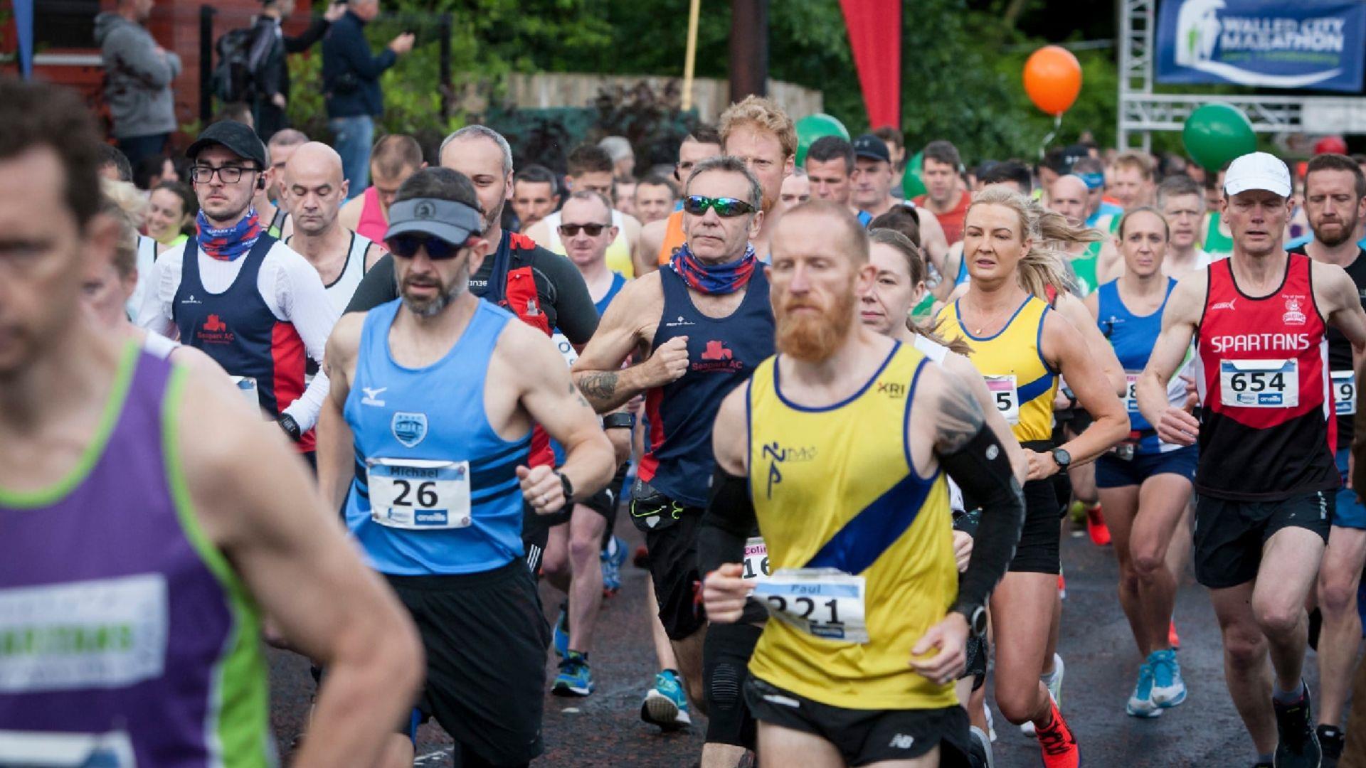 Group of people running in a marathon