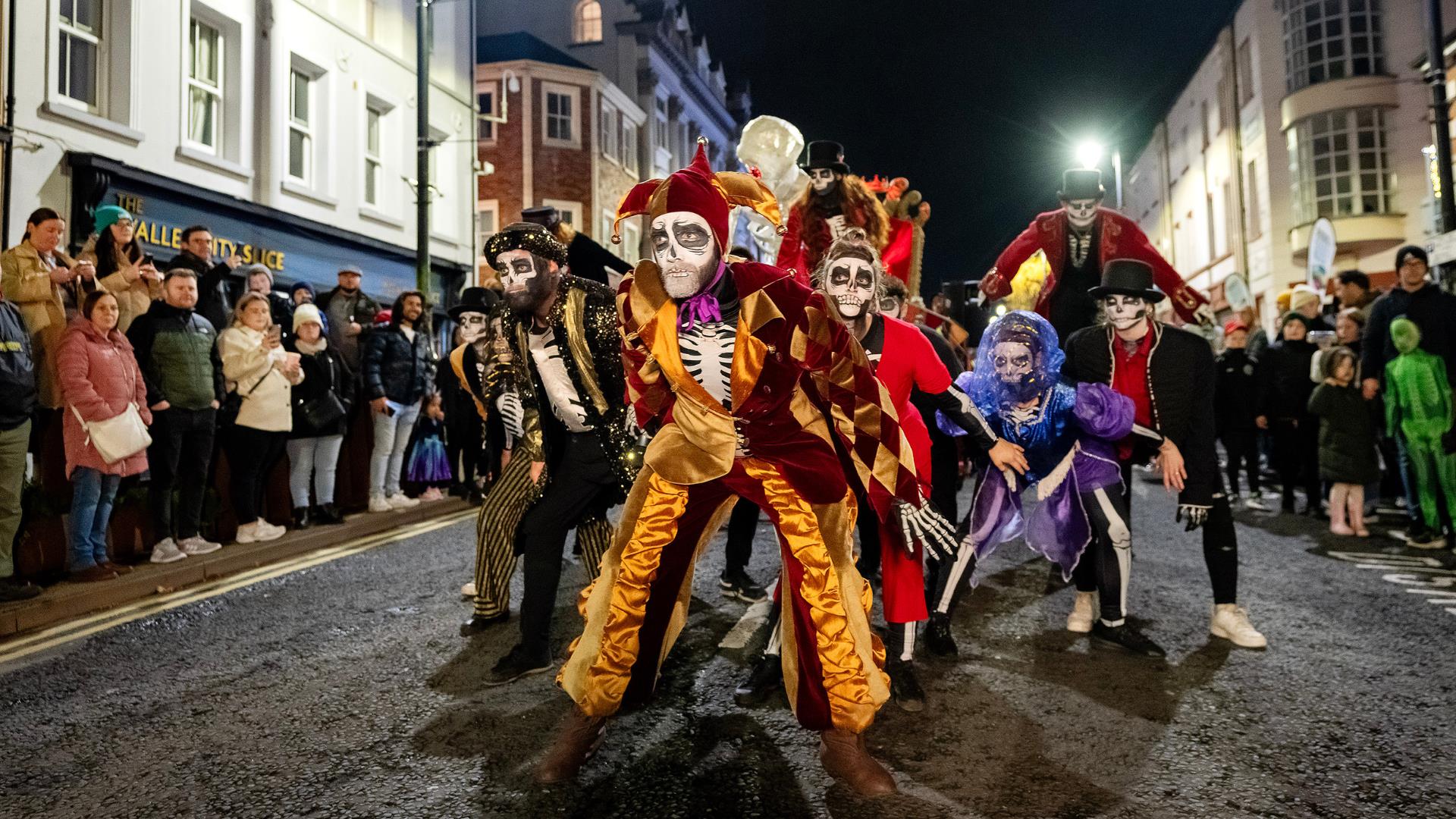 Halloween characters taking part in the parade