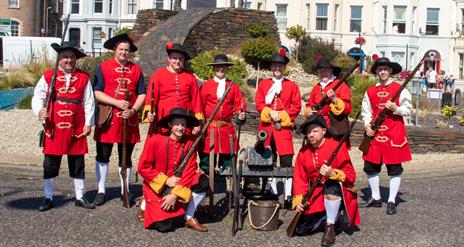 Group photo of people in costume.