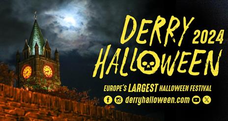 Derry Halloween banner with the Guildhall in the background.