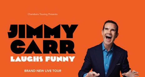 Promotional image of Jimmy Carr laughing.