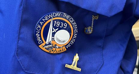 Blue jacket with antique badge