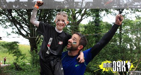 Promotional image for Mini OAK, with a child with his arm raised in a victory gesture.