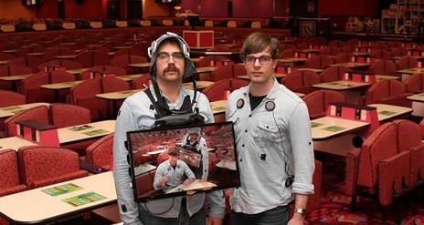 Two men standing in a bingo room