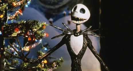 Jack Skellington in front of a Christmas tree