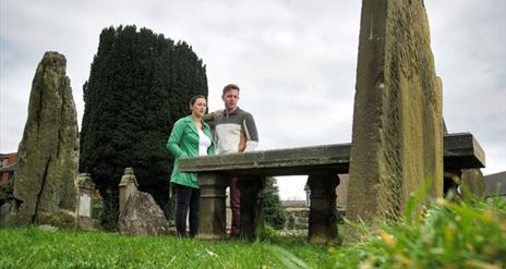 Visitors at Patrick Street Graveyard in Strabane. 
