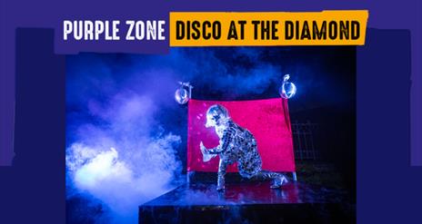 Dancer surrounded by smoke promoting the Disco at the Diamond as part of the Derry Halloween Awakening Trail 2025